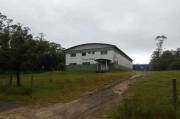 Foto principal do lote Terreno com área de 5.340,37m², com Edificação de aprox. 600,00m², situado no Núcleo Industrial João Sônego, em Treviso/SC do leilão Criciúma/SC - 1ª Vara do Trabalho em Criciúma.