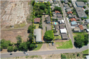 Foto principal do lote Terreno com área total de 4.800,00m², com 6 Edificações (casas e galpão industrial), em Criciúma/SC do leilão Criciúma/SC - 1ª Vara Cível em Criciúma.