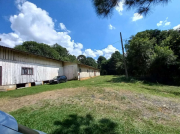 Foto principal do lote Terreno com área de 18.242,00m², com edificação, no Município de Rio Negrinho/SC do leilão São Bento do Sul/SC - Vara do Trabalho em São Bento do Sul.