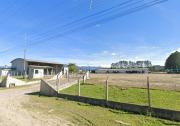 Foto principal do lote Terreno com área de 10.000,00m², com pavilhão de 300,00m², no Município de Siderópolis/SC do leilão Leilão Extrajudicial - Sicoob Credisulca - Siderópolis/SC - 2º LEILÃO em Siderópolis.